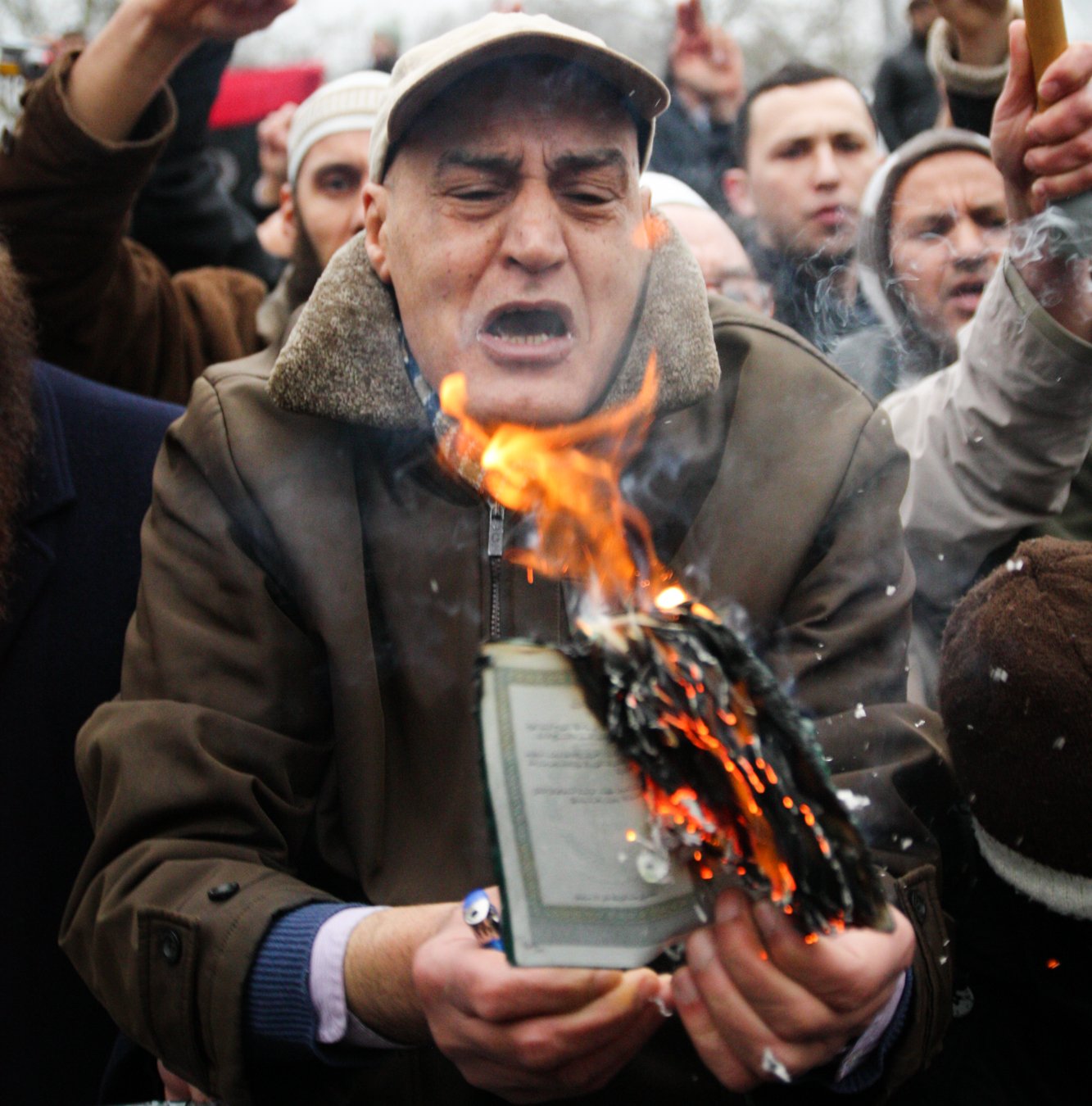 Libyan burning Libyan passport during anti-Gaddafi protests in London