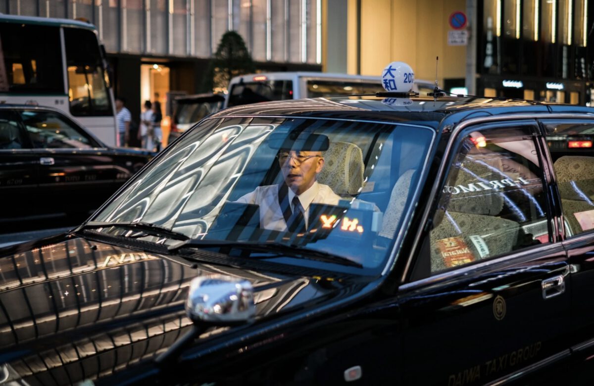 Japanese taaxi driver, Tokyo, Japan, night shot.