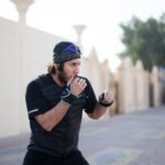 Fahad Khalid Al-Thani throwing a punch during a lifestyle brand photoshoot.