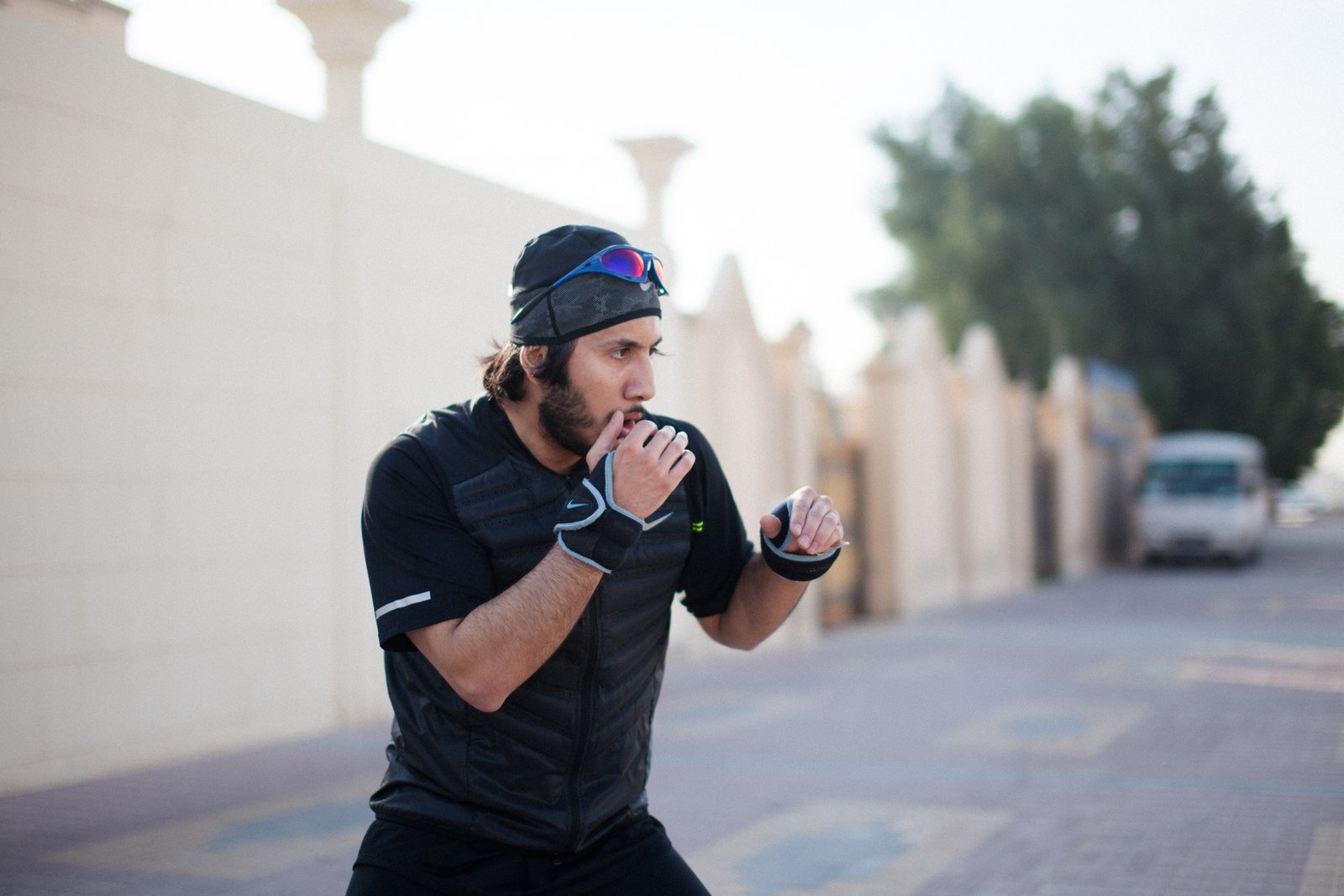 Fahad Khalid Al-Thani throwing a punch during a lifestyle brand photoshoot.